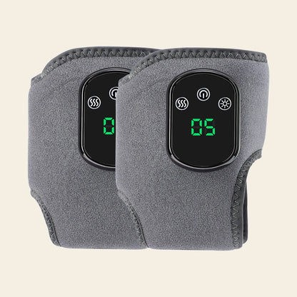 A pair of grey heated ankle wraps side by side, both showing the lit control panel