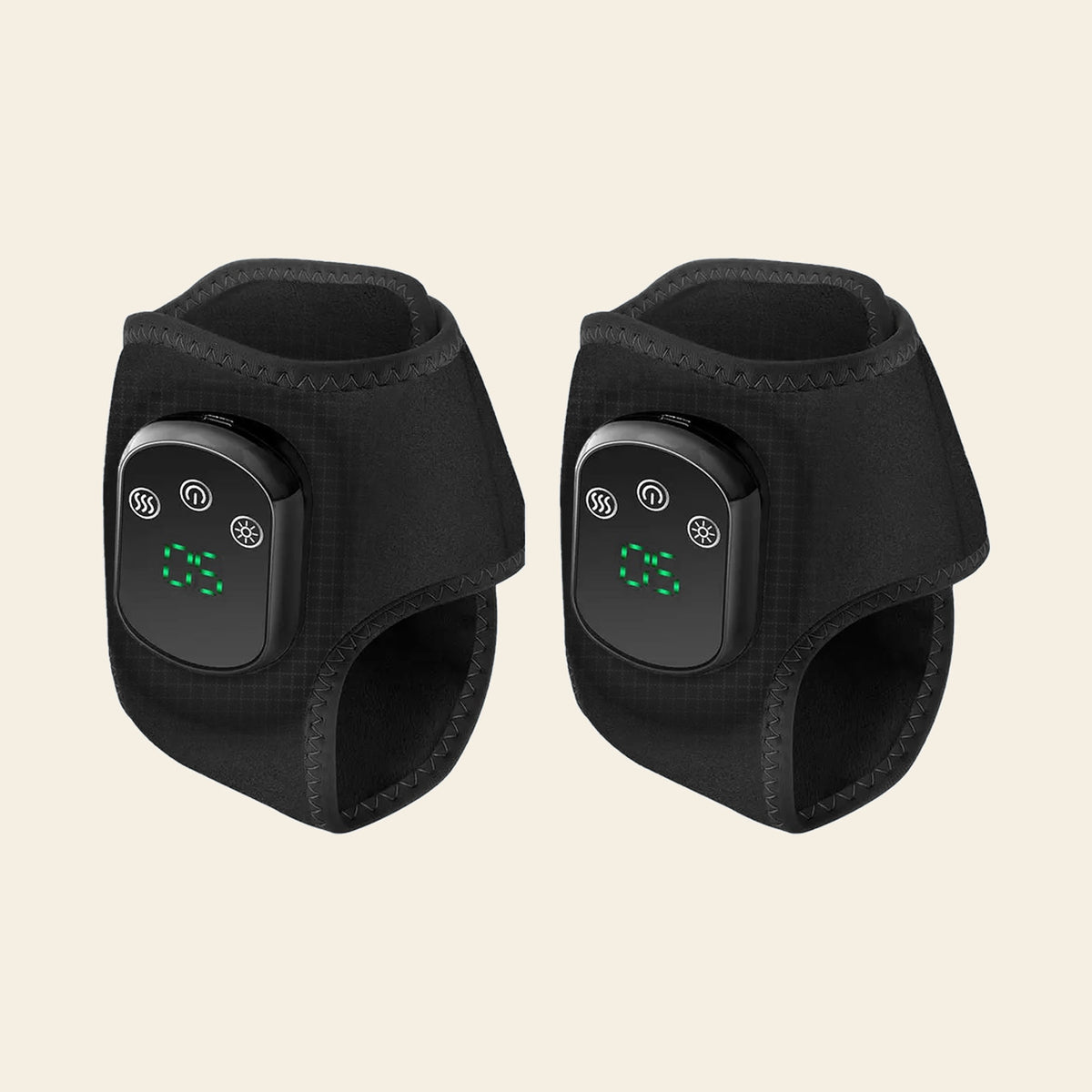 A pair of black heated ankle wraps shown side by side