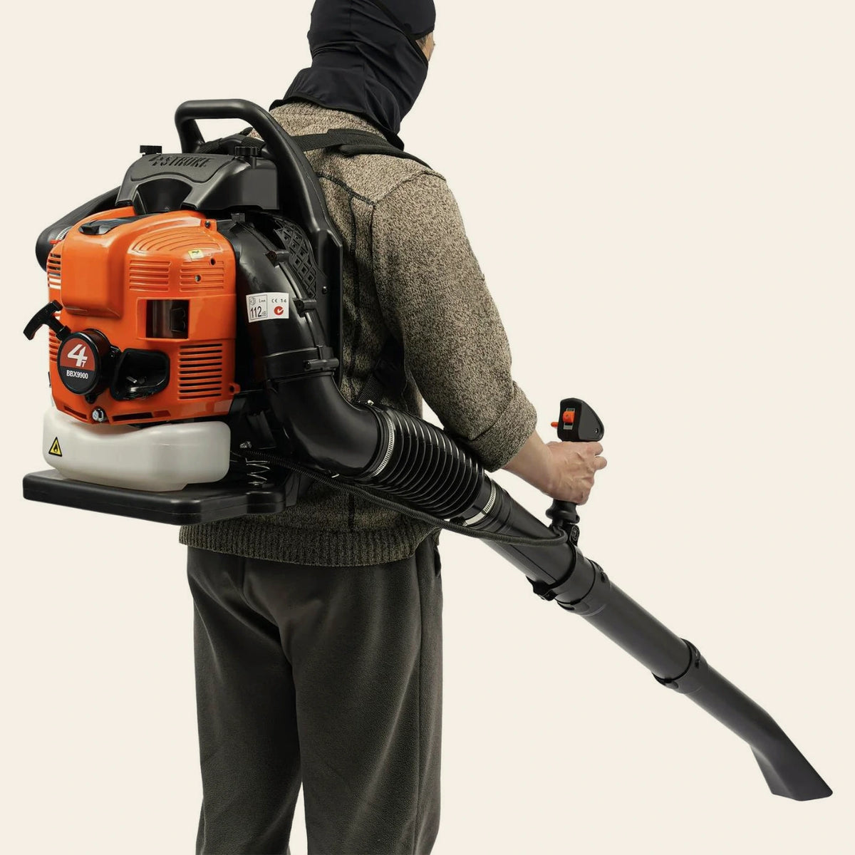 YardEdge Pro 4-stroke backpack leaf blower showing the engine unit, fuel tank and throttle control on the tube handle