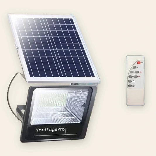 YardEdge Pro 30W solar flood light with its separate solar panel and remote control, shown against a beige background